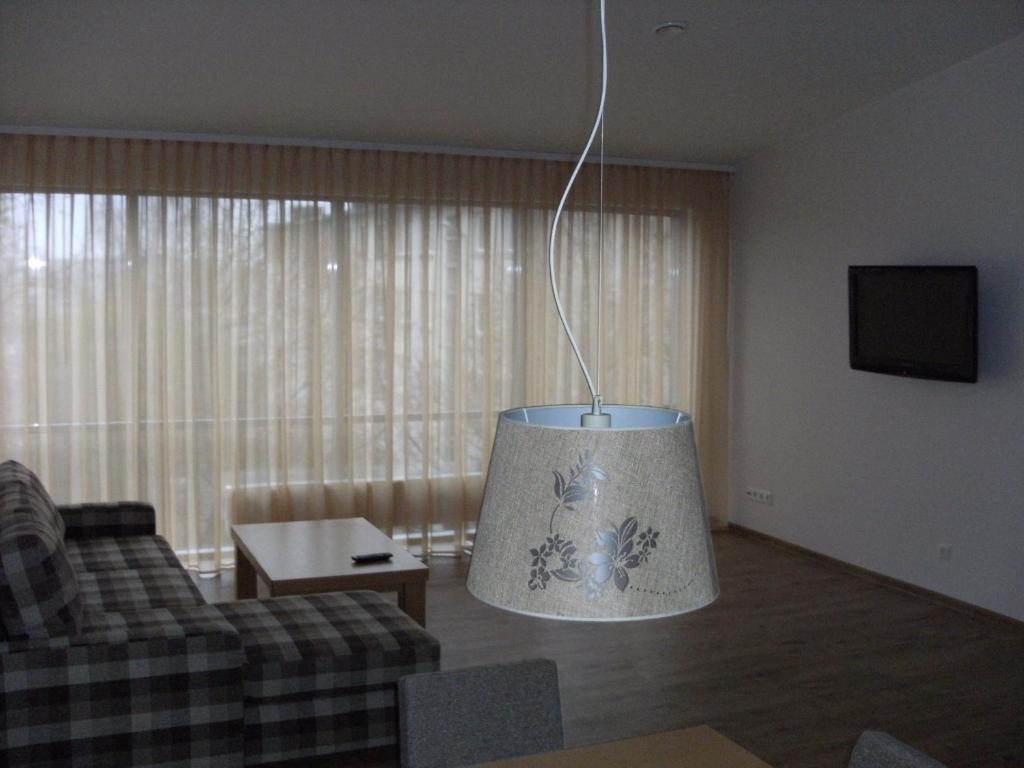 TV a/nebo společenská místnost v ubytování Litrada Apartments