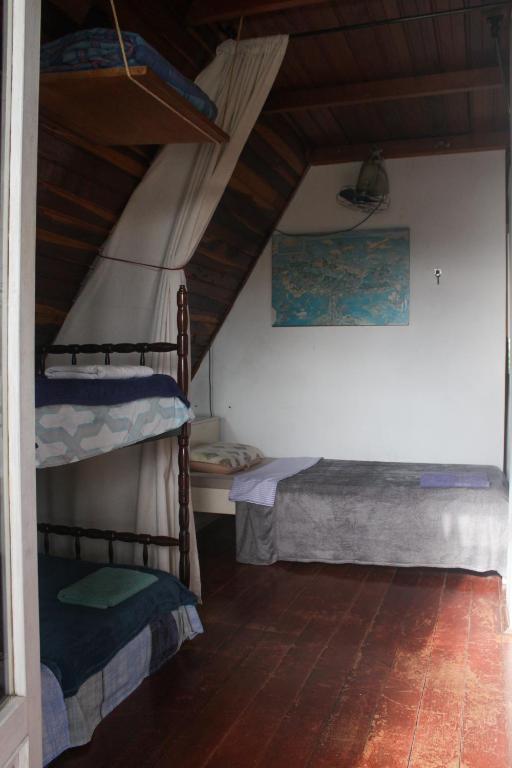Postel nebo postele na pokoji v ubytování Cabanna Hostel