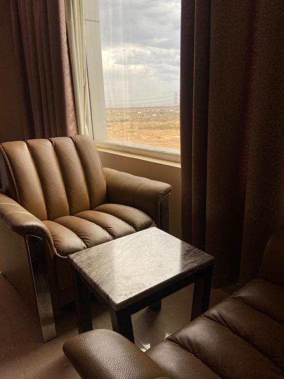 Posezení v ubytování Al- Reef Hotel