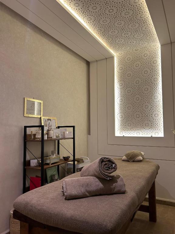 Postel nebo postele na pokoji v ubytování Luxe Nomade Marrakech & Spa