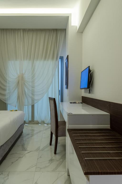 Postel nebo postele na pokoji v ubytování Nordlicht Hotel Marina Al Alamein