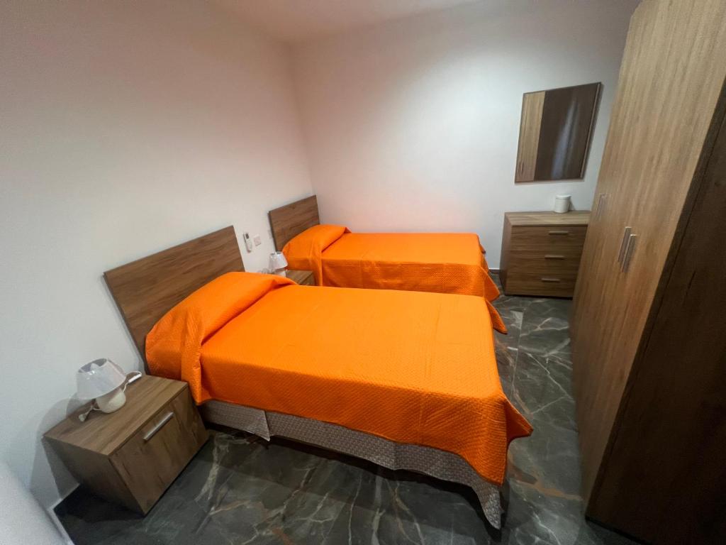Postel nebo postele na pokoji v ubytování Stella Maris Mansions