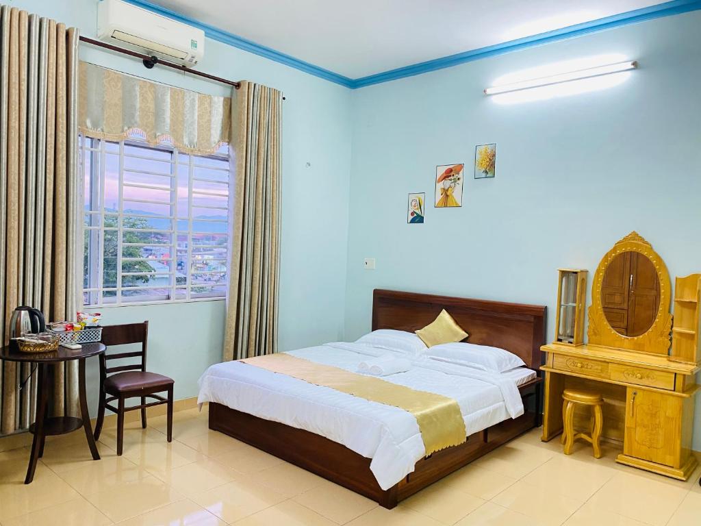 Postel nebo postele na pokoji v ubytování Phú Mỹ Port Motel