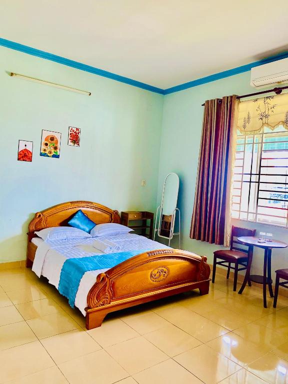 Postel nebo postele na pokoji v ubytování Phú Mỹ Port Motel