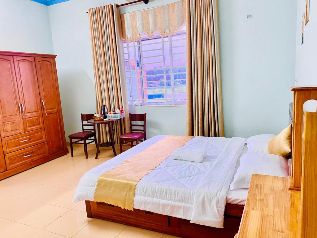 Postel nebo postele na pokoji v ubytování Phú Mỹ Port Motel
