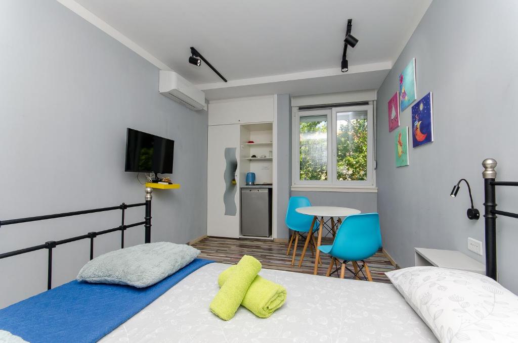 Posteľ alebo postele v izbe v ubytovaní Malena rooms