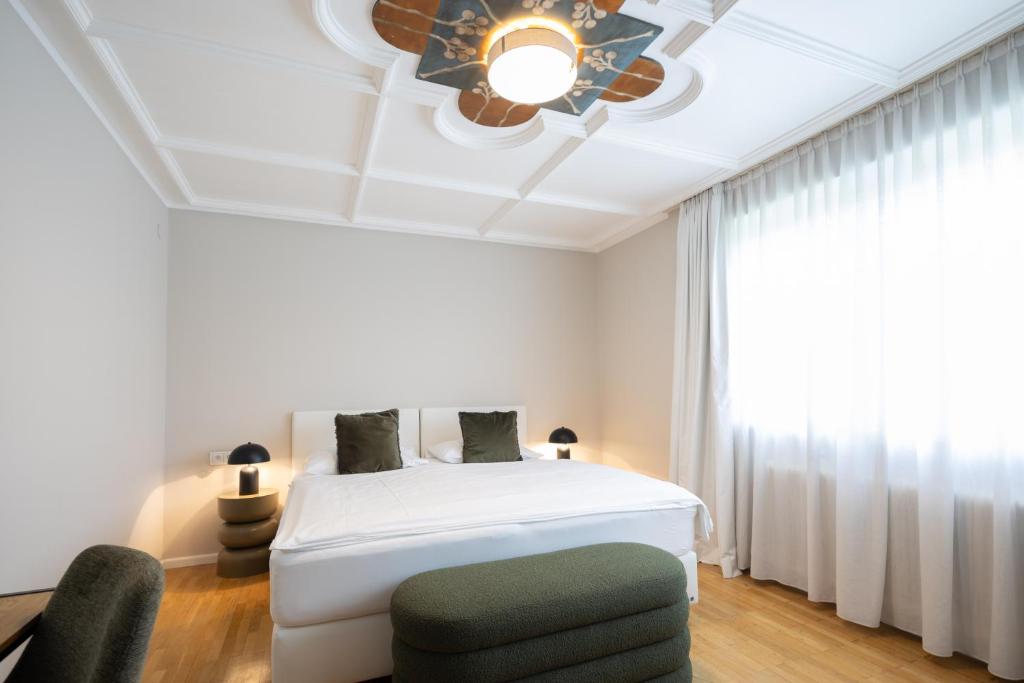 Postel nebo postele na pokoji v ubytování Q! Hotel Maria Theresia