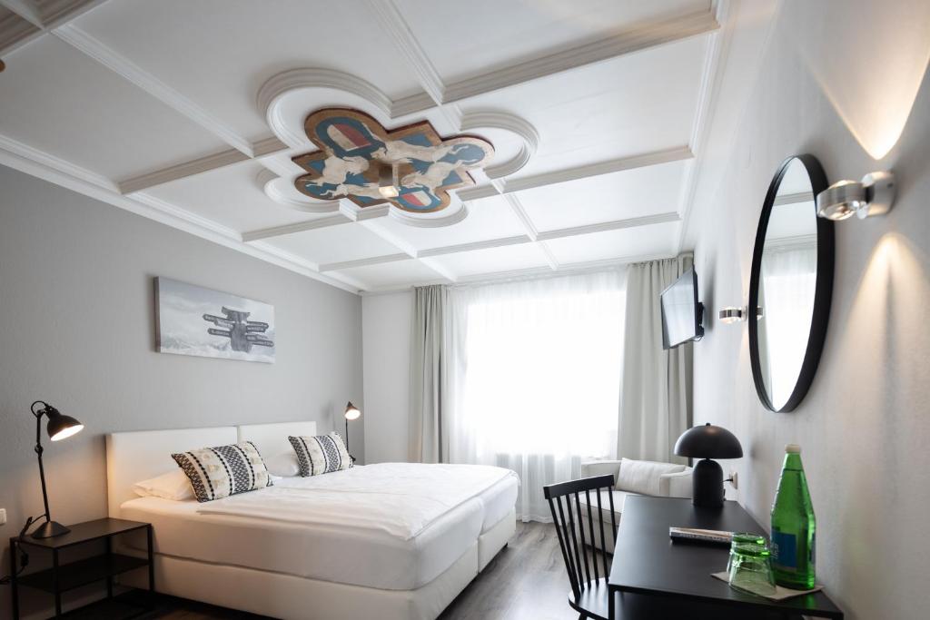 Postel nebo postele na pokoji v ubytování Q! Hotel Maria Theresia