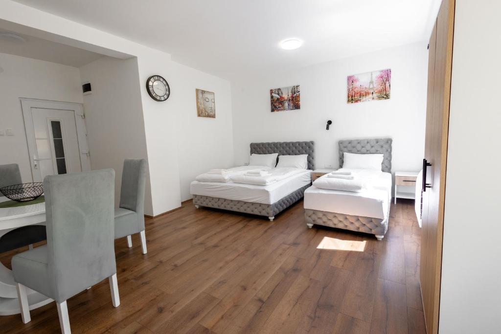Postel nebo postele na pokoji v ubytování Luna Nera apartments