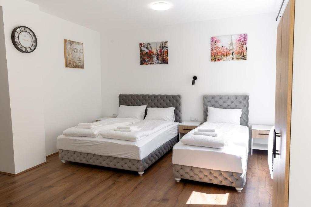 Postel nebo postele na pokoji v ubytování Luna Nera apartments