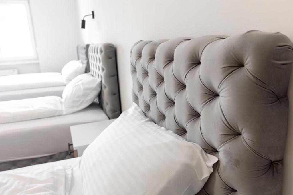 Postel nebo postele na pokoji v ubytování Luna Nera apartments