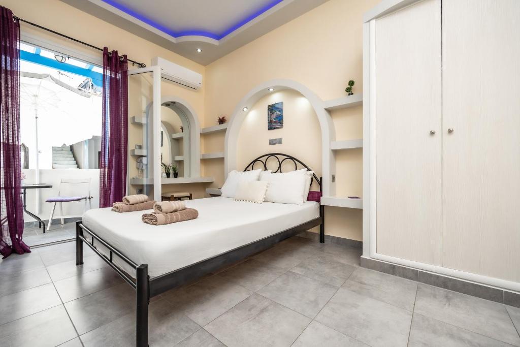 Posteľ alebo postele v izbe v ubytovaní Lefkes Studios