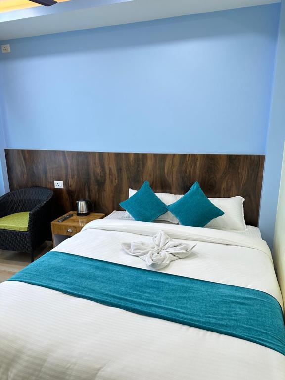 Postel nebo postele na pokoji v ubytování Crystal Apartment