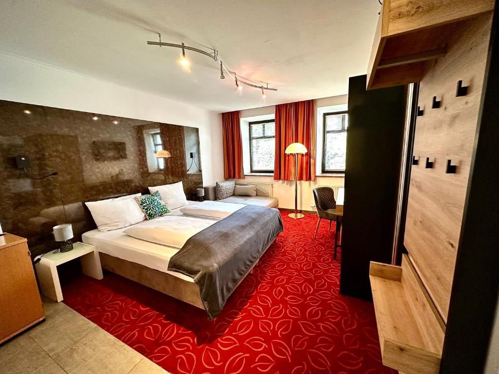 A bed or beds in a room at Bed & Rooms, Wörgl