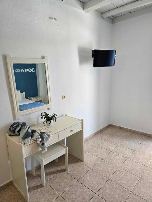 TV a/nebo společenská místnost v ubytování Faros Rooms