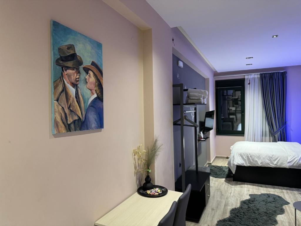 Łóżko lub łóżka w pokoju w obiekcie Elegant Studio
