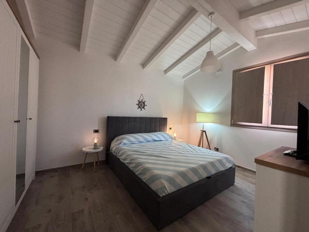 Postel nebo postele na pokoji v ubytování House Pan di Zucchero