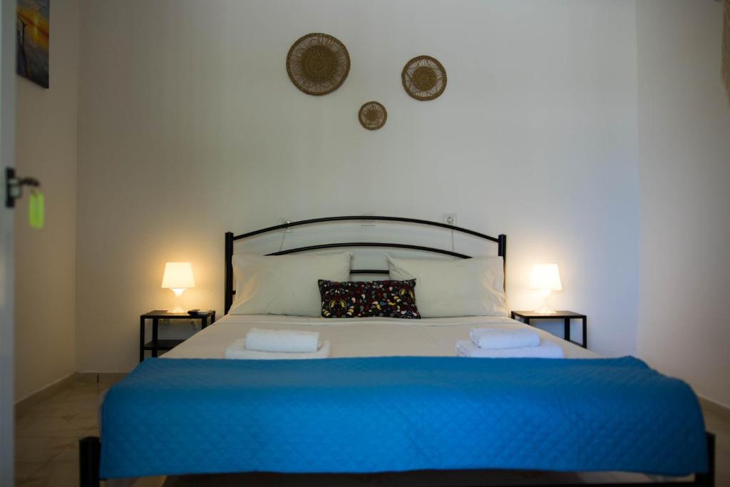 Postel nebo postele na pokoji v ubytování G&A Rooms Marmari