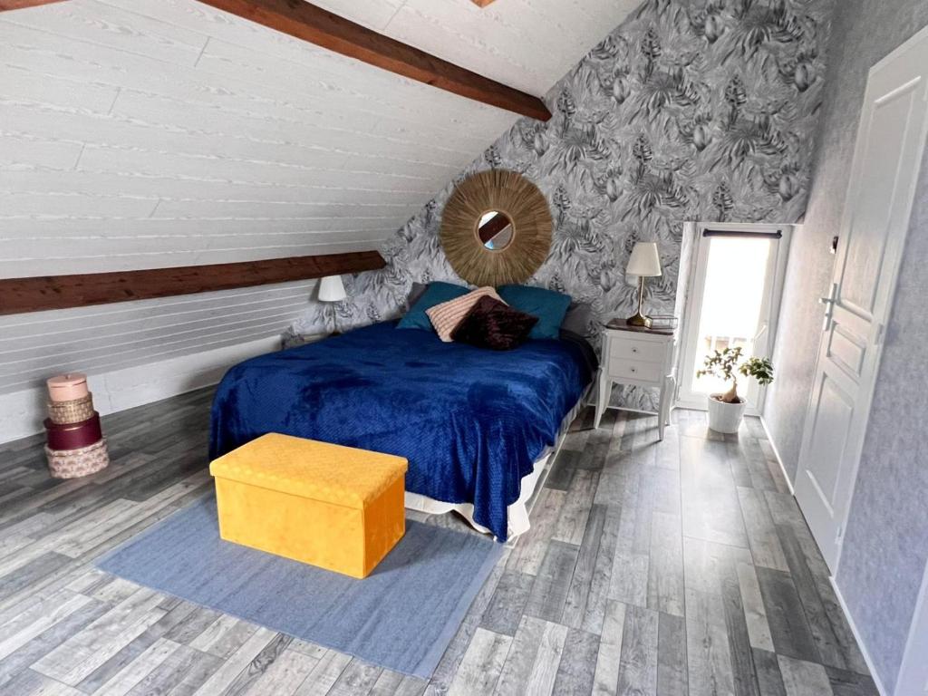Postel nebo postele na pokoji v ubytování Les palmiers