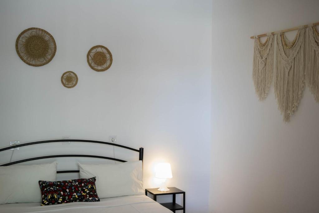 Postel nebo postele na pokoji v ubytování G&A Rooms Marmari