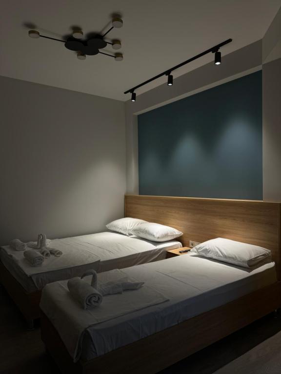 Postel nebo postele na pokoji v ubytování Hotel Boutique Adam