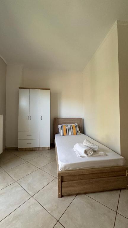 Postel nebo postele na pokoji v ubytování MF Apartment