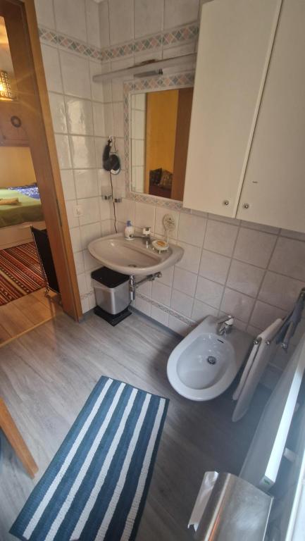 Koupelna v ubytování Casa Tipica Arbedese