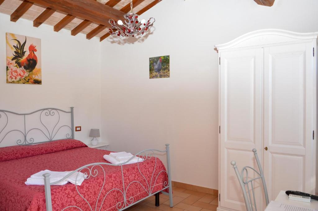 Łóżko lub łóżka w pokoju w obiekcie Agriturismo "La Fraschetta"
