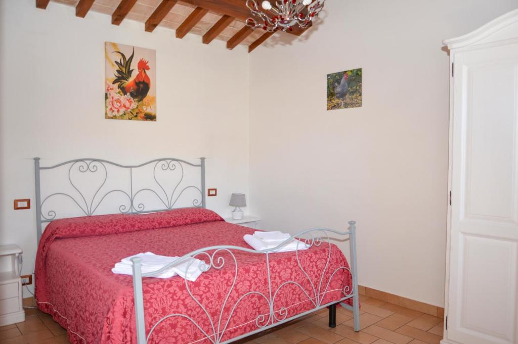 Łóżko lub łóżka w pokoju w obiekcie Agriturismo "La Fraschetta"