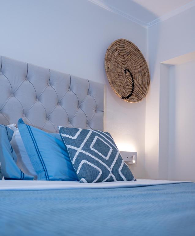 Postel nebo postele na pokoji v ubytování Coconut Blue