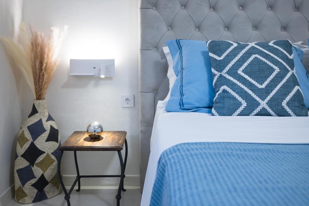 Postel nebo postele na pokoji v ubytování Coconut Blue