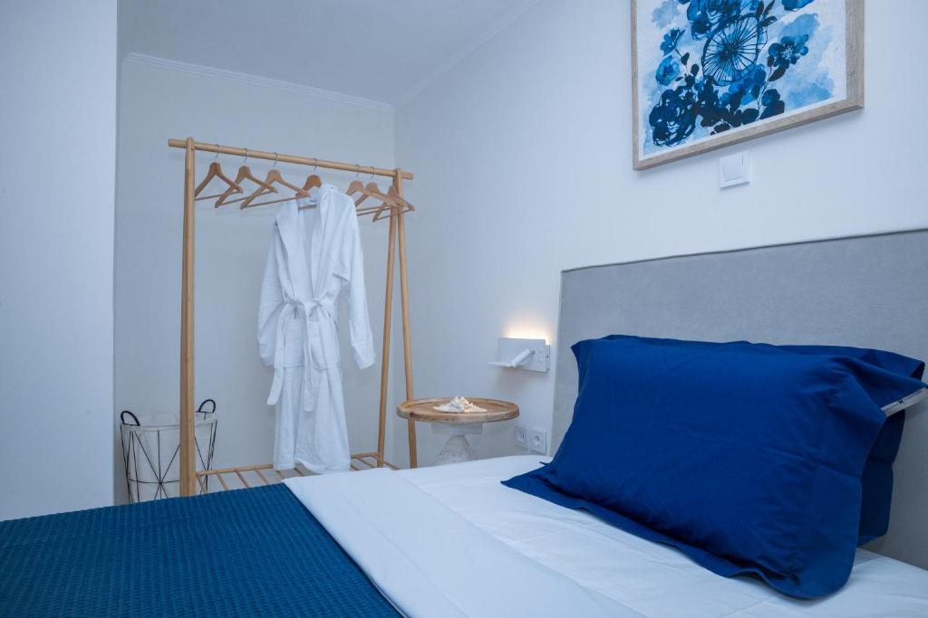 Postel nebo postele na pokoji v ubytování Coconut Blue
