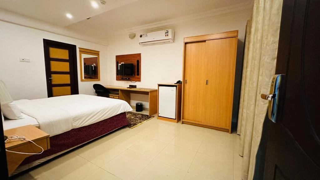 TV a/nebo společenská místnost v ubytování Star Dahlia Hotel
