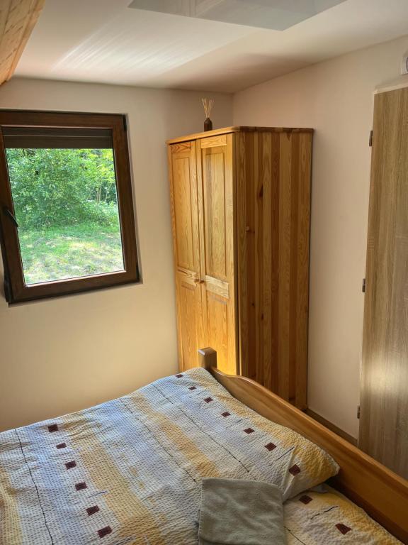 Postel nebo postele na pokoji v ubytování WBS Vinařství U Lisu Znojmo 6345