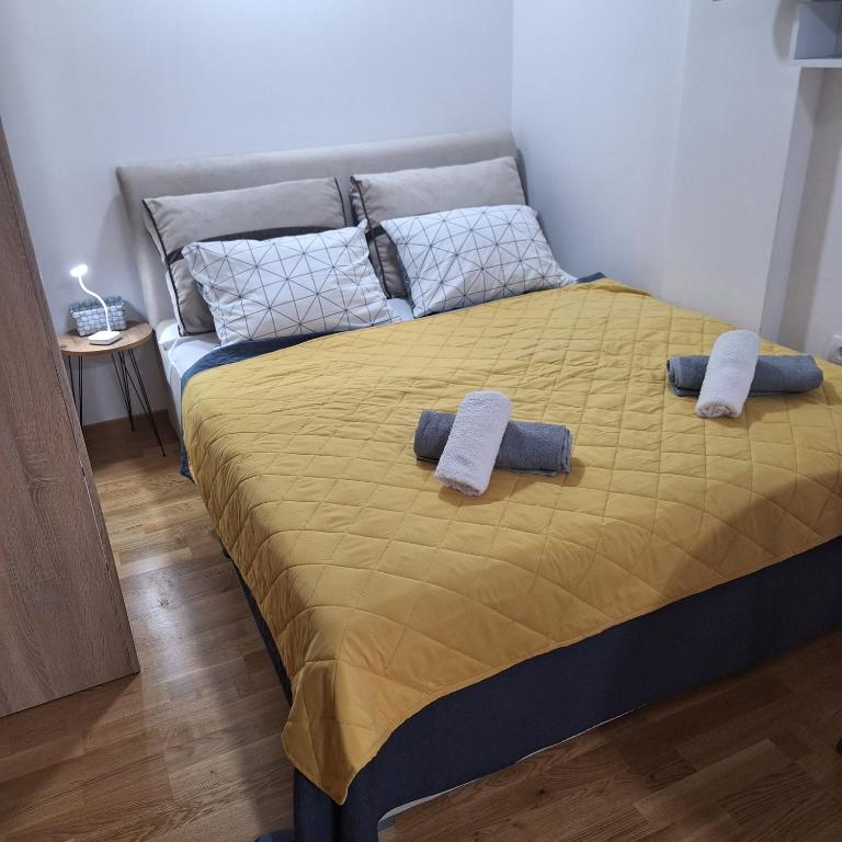 Postel nebo postele na pokoji v ubytování Studio apartman Delight Vrnjačka banja