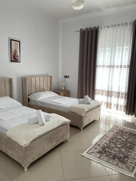 Voodi või voodid majutusasutuse Harmony Villa Berat toas