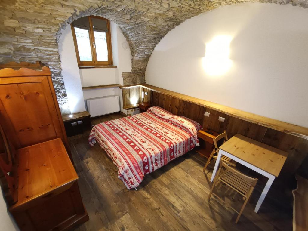Postel nebo postele na pokoji v ubytování B&B La Presef