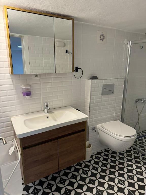 Koupelna v ubytování Held Hotel