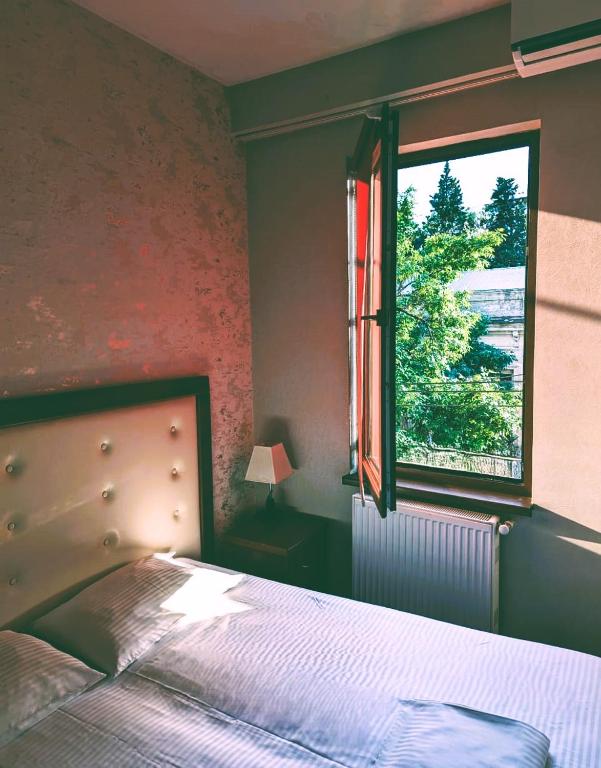 Postel nebo postele na pokoji v ubytování The Rogashome