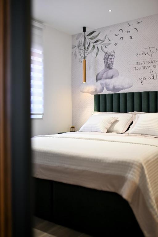Posteľ alebo postele v izbe v ubytovaní Apartments and Rooms Nekic