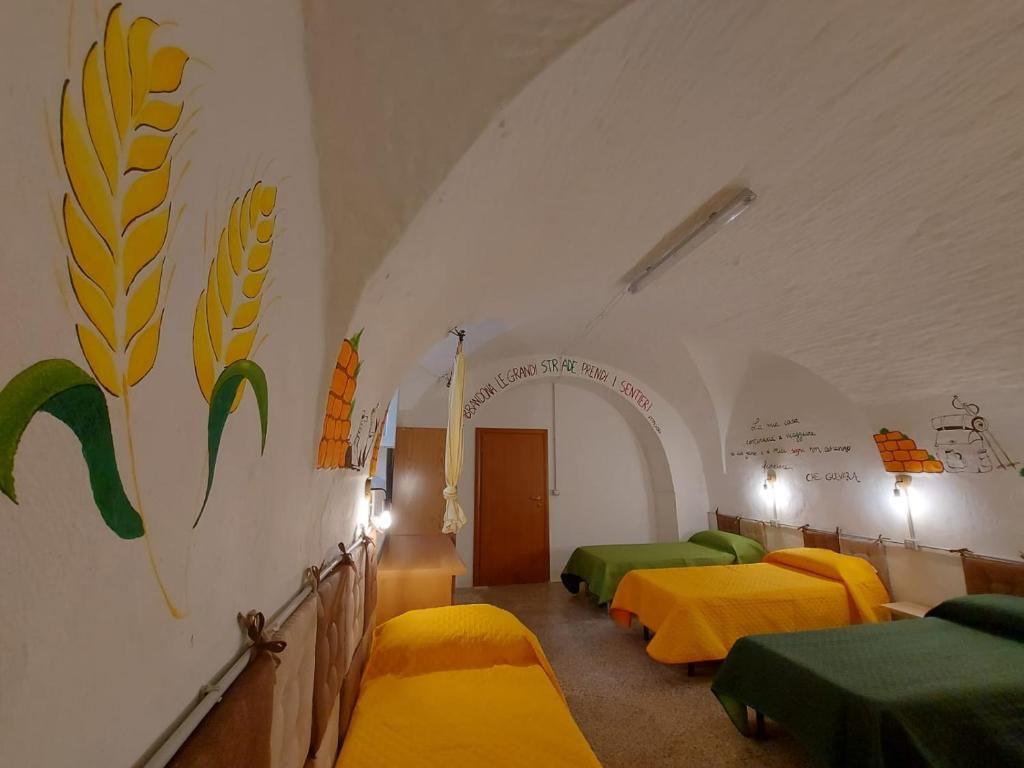 Postel nebo postele na pokoji v ubytování Lupus in Fabula