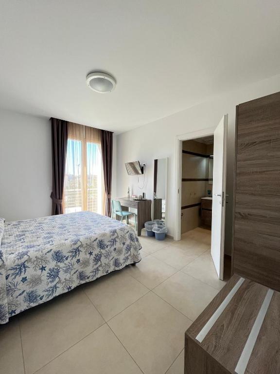 Postel nebo postele na pokoji v ubytování B&B Le Maree