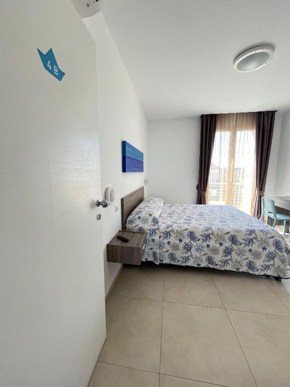 Postel nebo postele na pokoji v ubytování B&B Le Maree