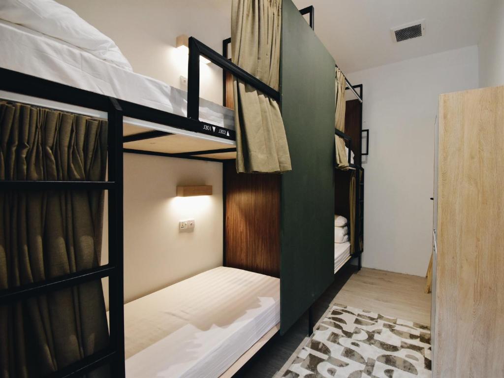 Postel nebo postele na pokoji v ubytování Jiran Hostel Kota Kinabalu
