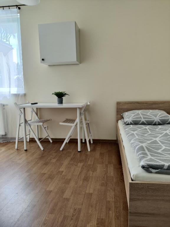 Postel nebo postele na pokoji v ubytování ProstyWynajem - Słoneczny Domek ROWY