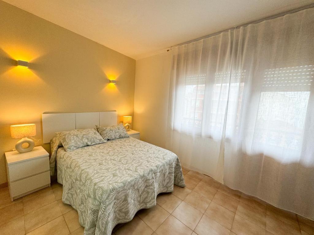 Postel nebo postele na pokoji v ubytování Apartamento LB, vistas a la ría