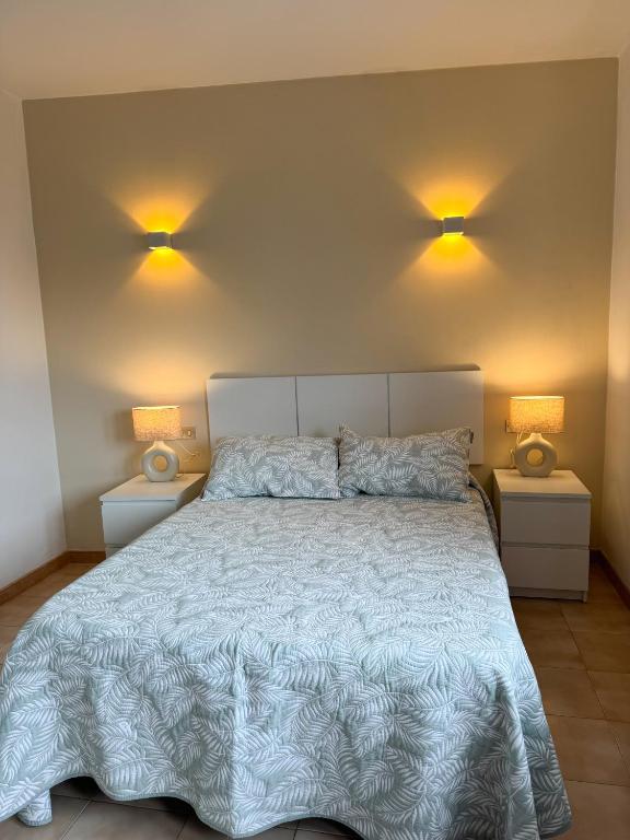 Postel nebo postele na pokoji v ubytování Apartamento LB, vistas a la ría