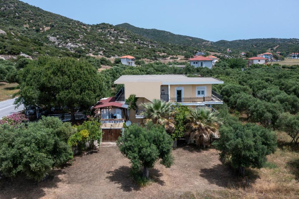 an aerial view of a house with trees at Villa Kali-mera in Sykia Chalkidikis