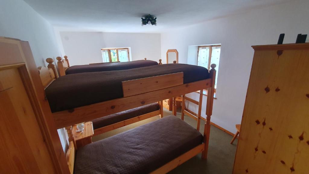 Postel nebo postele na pokoji v ubytování Appartamenti Nonno Gianni