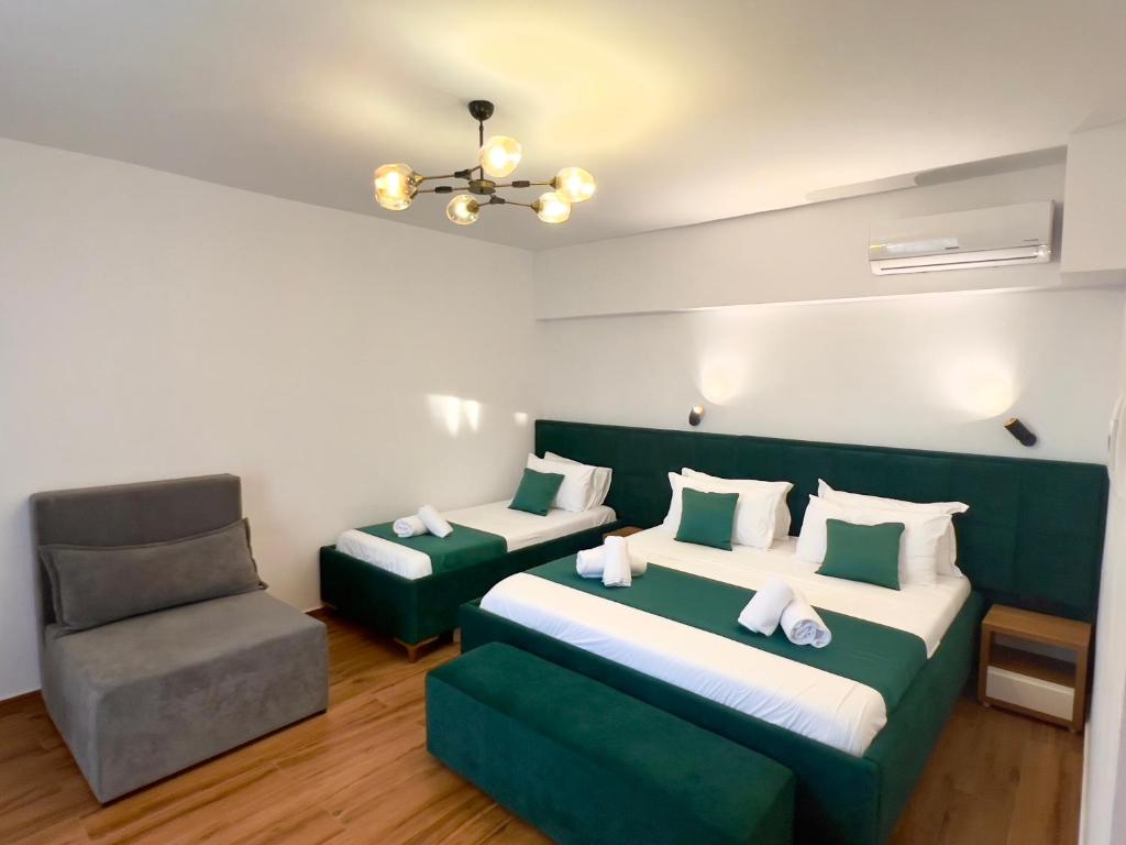 Cama o camas de una habitación en ILLYRIAN hotel Ksamil